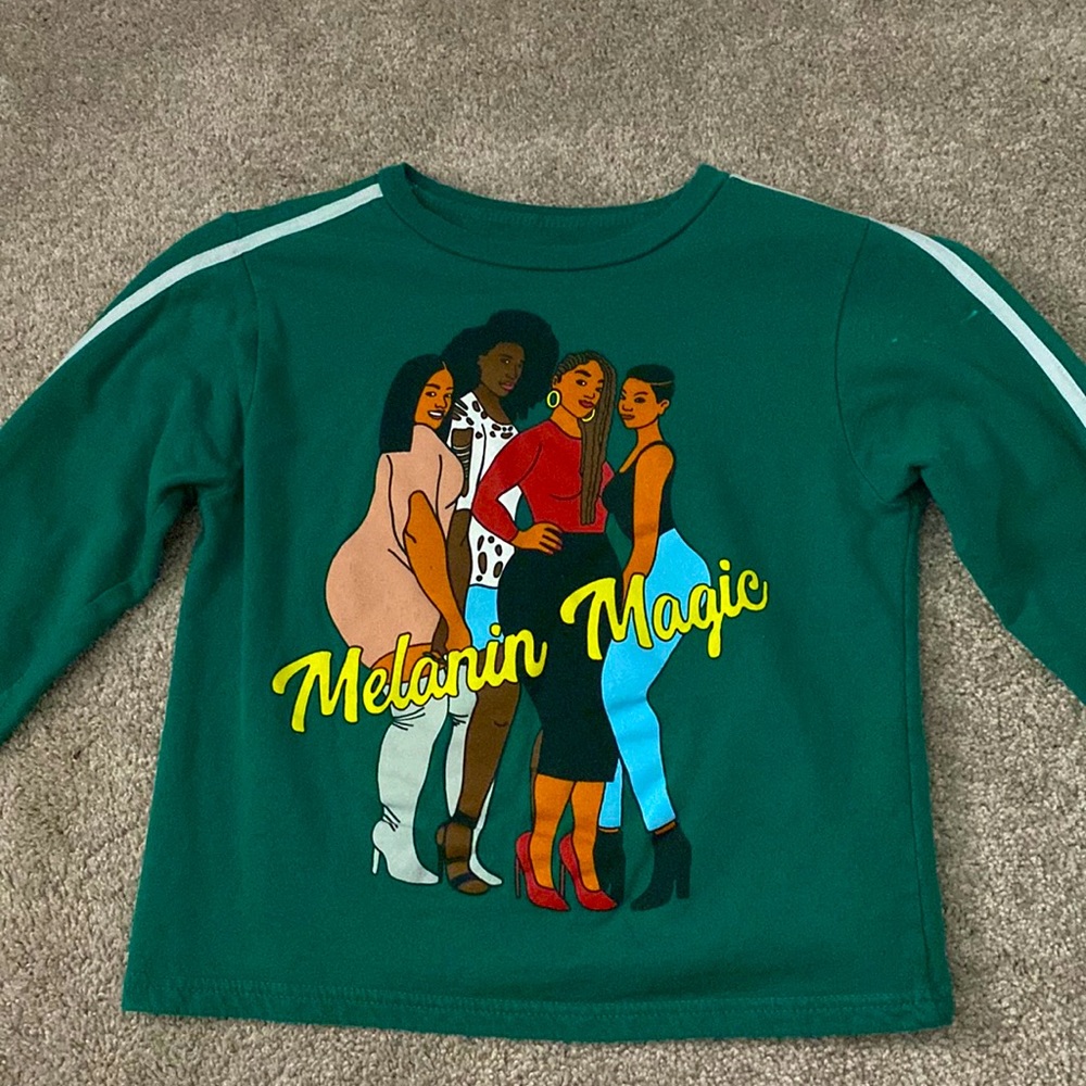 this is a cropped sweatshirt from rainbow. a size small. green